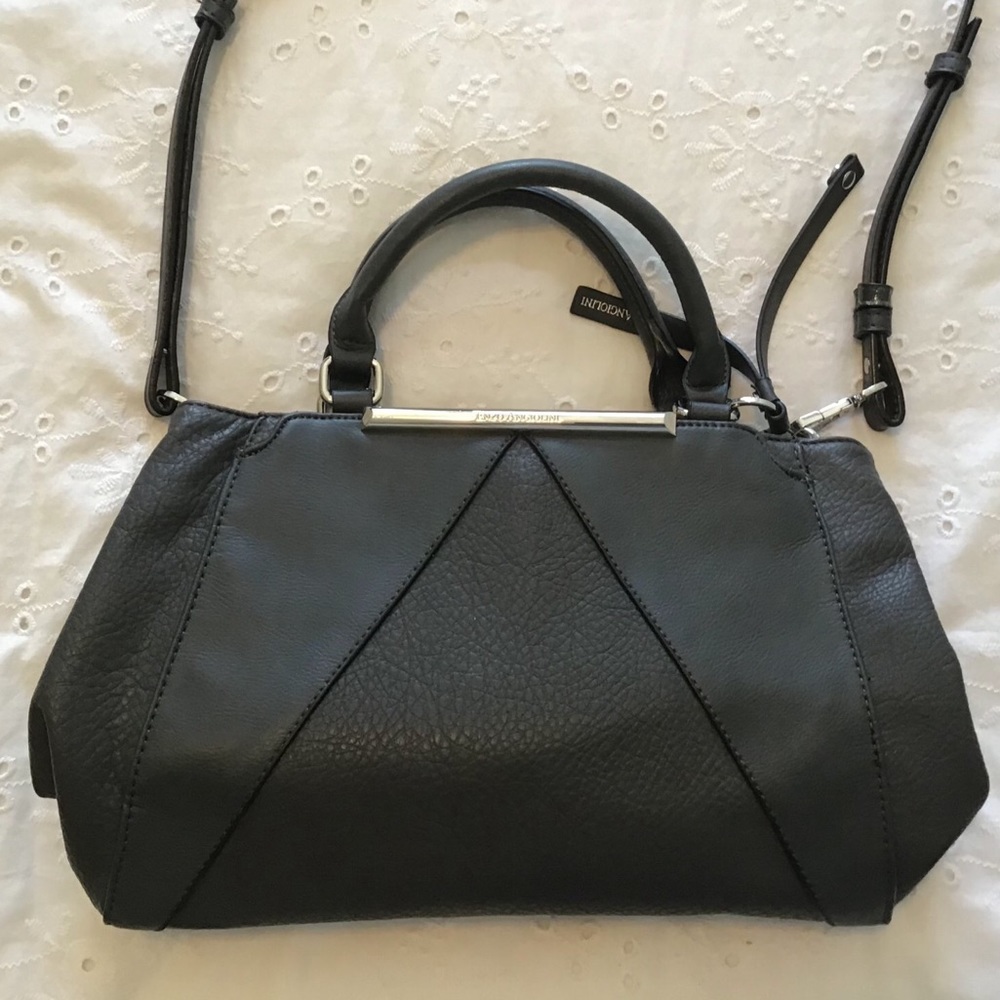 Looks like leather, but isn’t handbag. -5